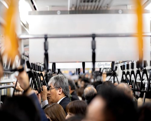 Using smartphone while commuting on public transport